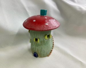 Green stem and red/white roofed Tealight