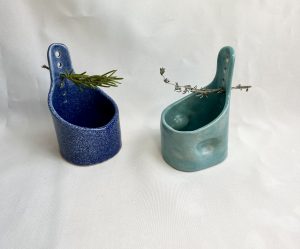 Two herb strippers, blue and green